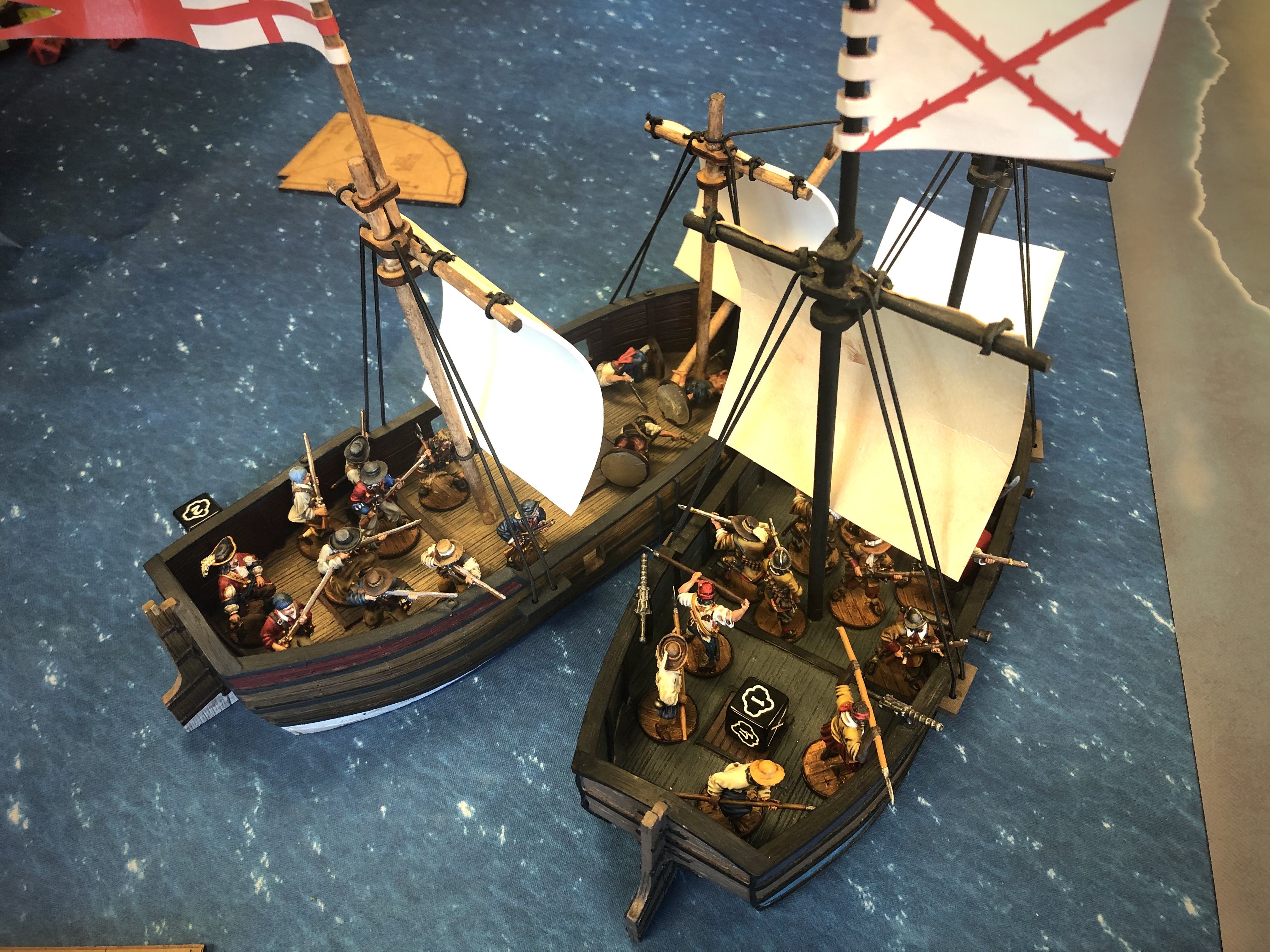 2 Blood & Plunder Ship models by Firelock Games engaging in a boarding action