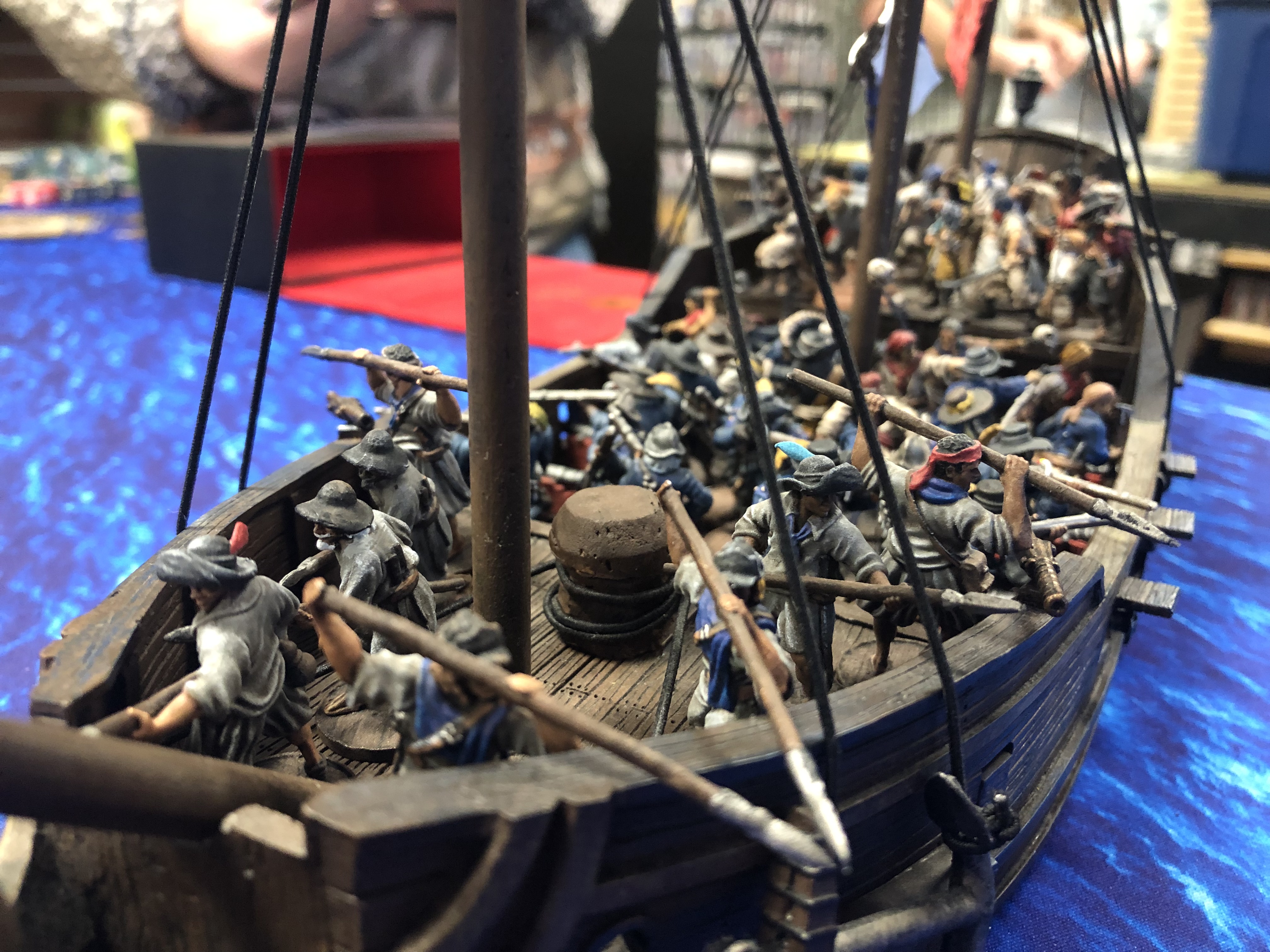 Cannon crews and sailors on a light frigate from Blood & Plunder