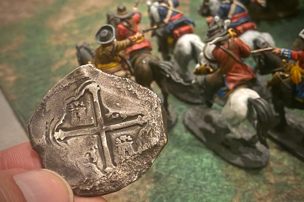 spanish cavalry models and a fortune token coin