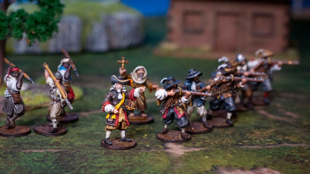 Spanish Infantry models with a commander and spiritual leader for Blood & Plunder