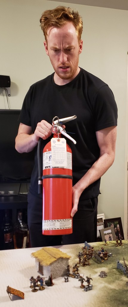 Aaron Guravich with a Fire Extinguisher
