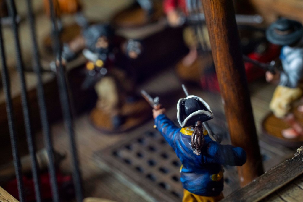 Maynard shooting Blackbeard. Blood and plunder