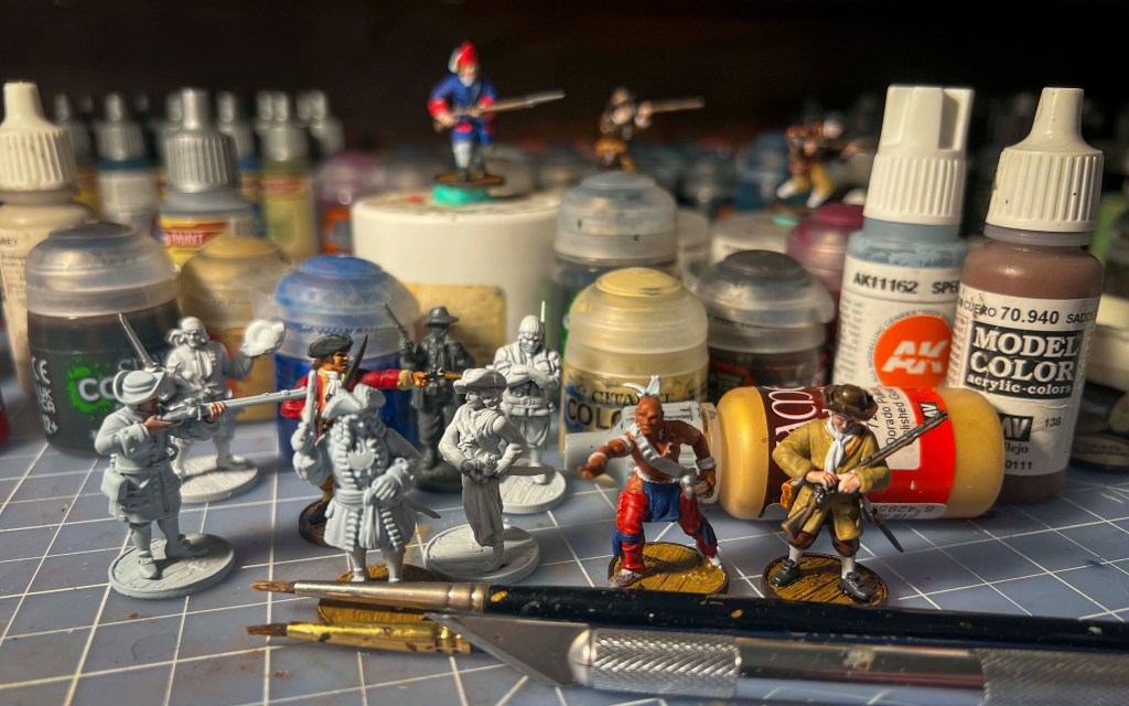 blood and plunder miniature getting painted.