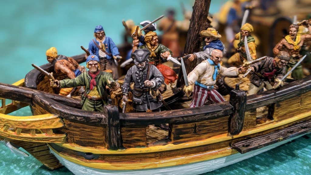 Benjamin Hornigold on the deck of a Bermuda sloop surrounded by fellow pirates