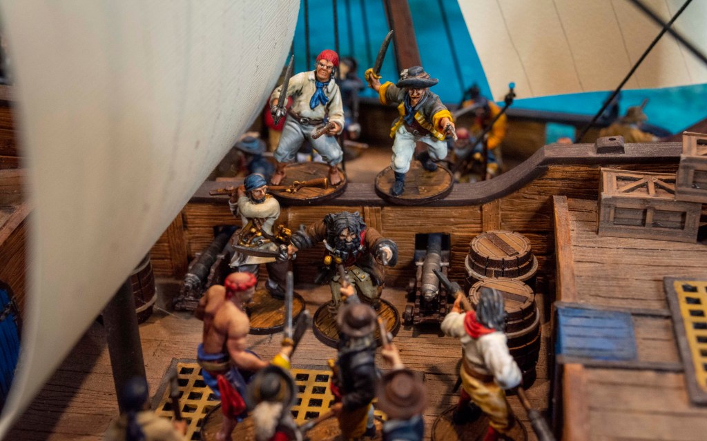 Blackbeard leading a boarding action
