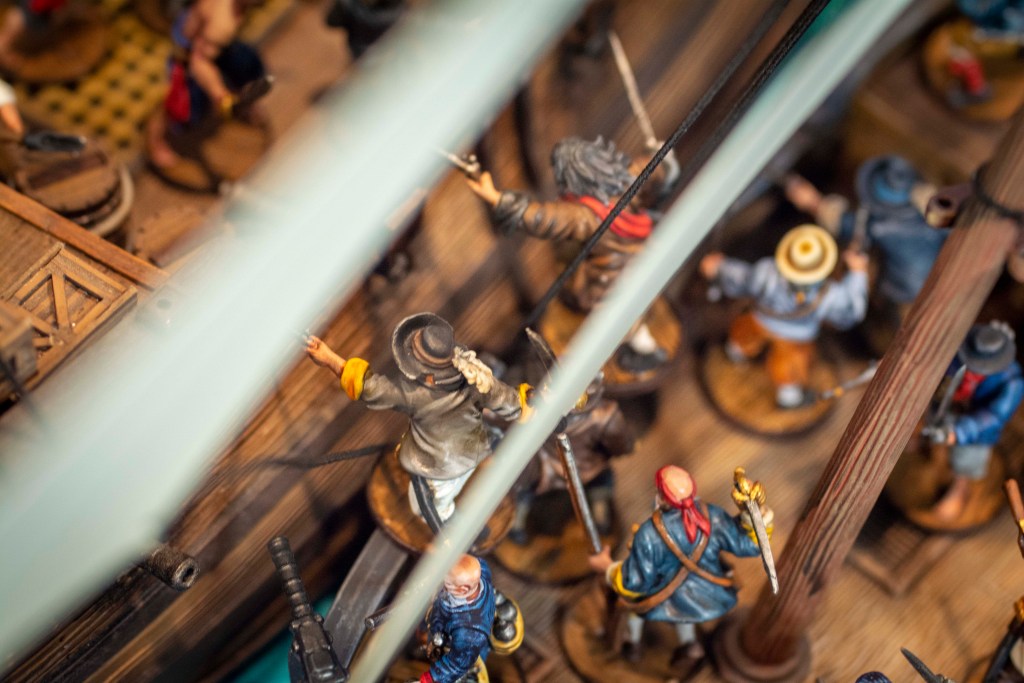 blackbeard leading a boarding party on to a fluyt.