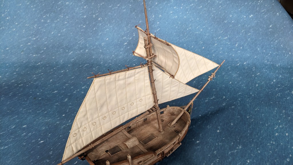Seamon's Quality Sails for a Bermuda Sloop - angeled rear view