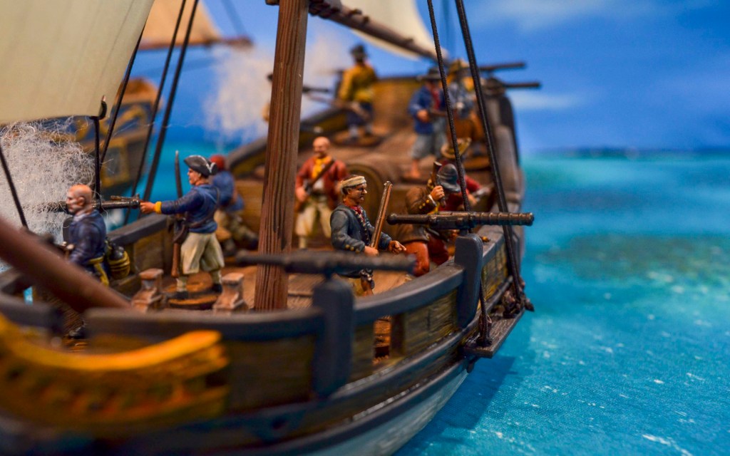 Artillery crews ready to fire their swivel guns