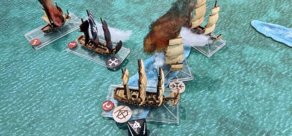 A wanted man scenario in progresr. Ships fighting, one is on fire.