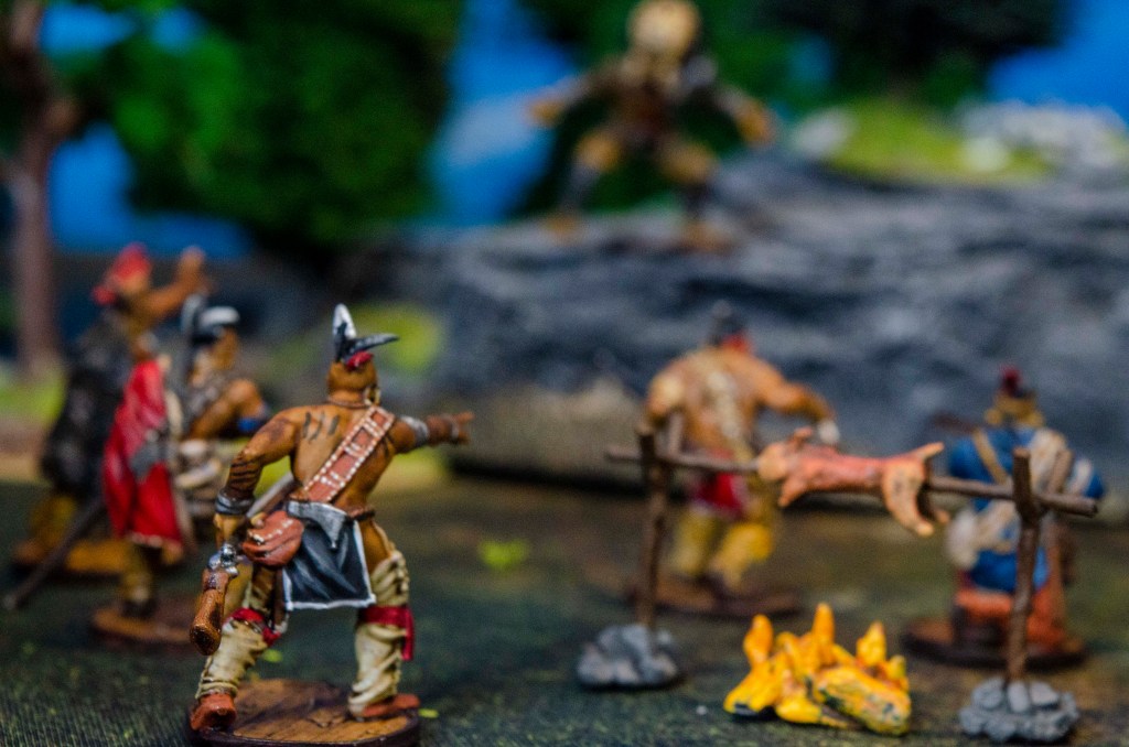 A Native American hunting party prepares to defend itself from an Alien hunter