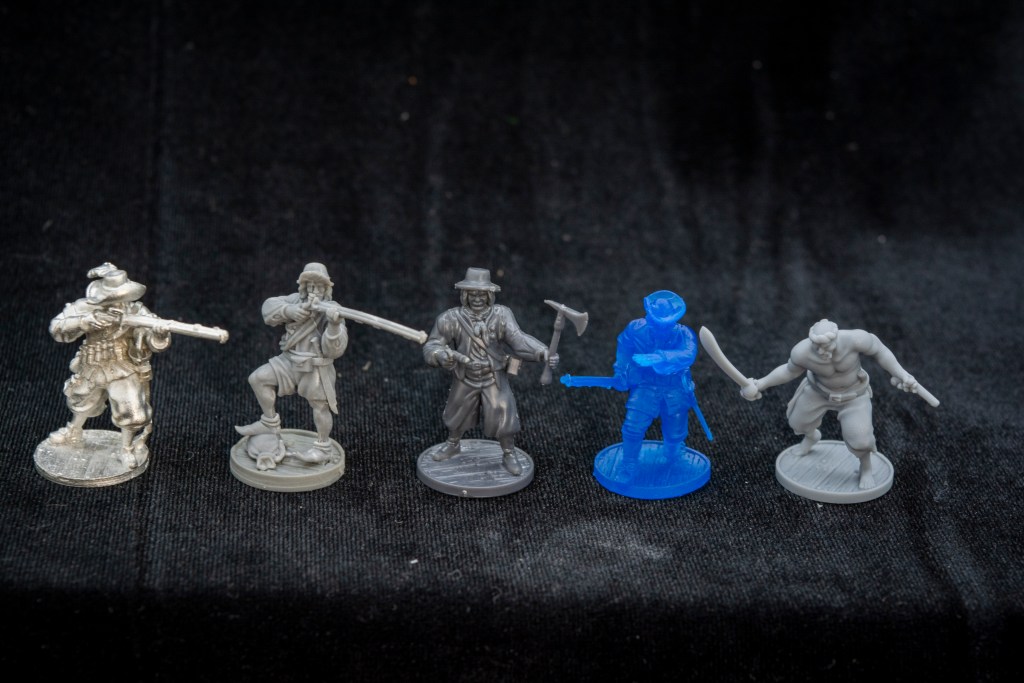 Firelock Games Miniatures of various printing mediums over time