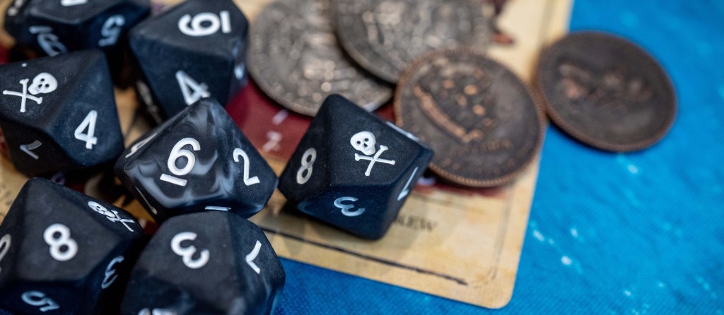 Pirates dice from Baron of Dice, fortune tokens, cards for Blood & Plunder