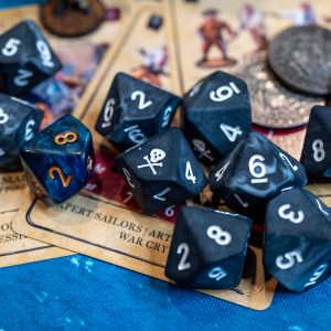 Pirates dice from Baron of Dice, fortune tokens, cards for Blood & Plunder