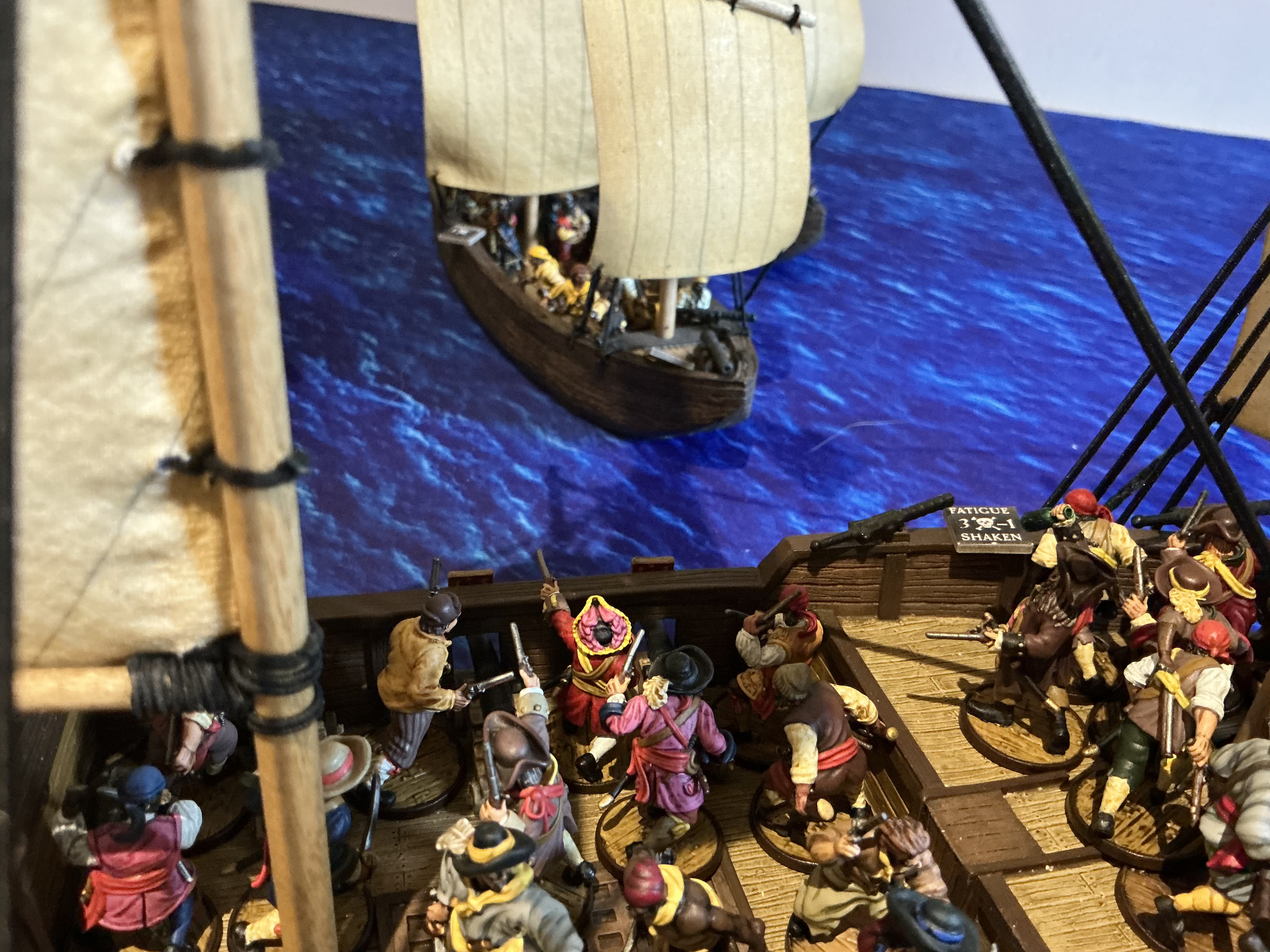 Ship battle with a raking shot on the horizon - photo by Crazycoote