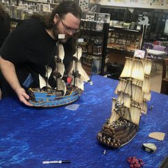 Two galleons in a cannon duel