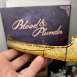 blood and plunder painted birchbark canoe