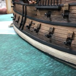 Galleon gunports open and cannons at the ready