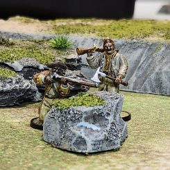 Rocky hill with two Blood & Plunder miniatures